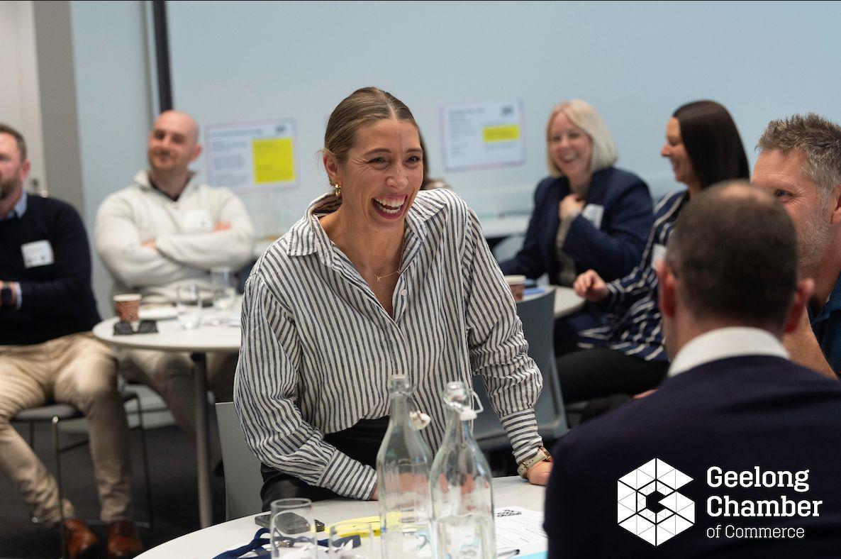 A participant laughing mid-conversation during the session