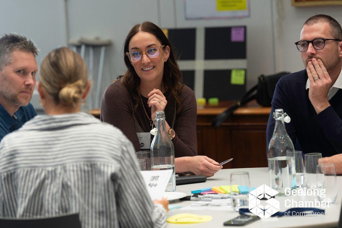A table group working through a decision together