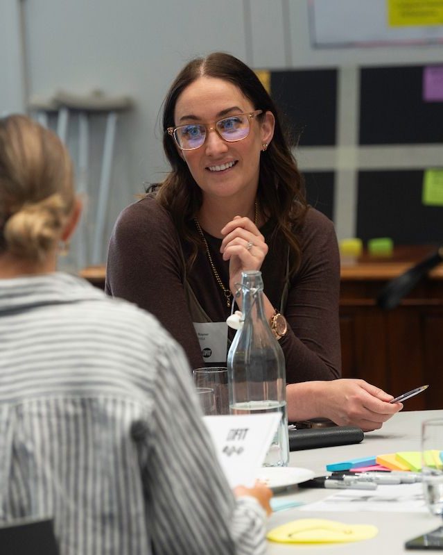 A leader making her case at a Straforma Arena table